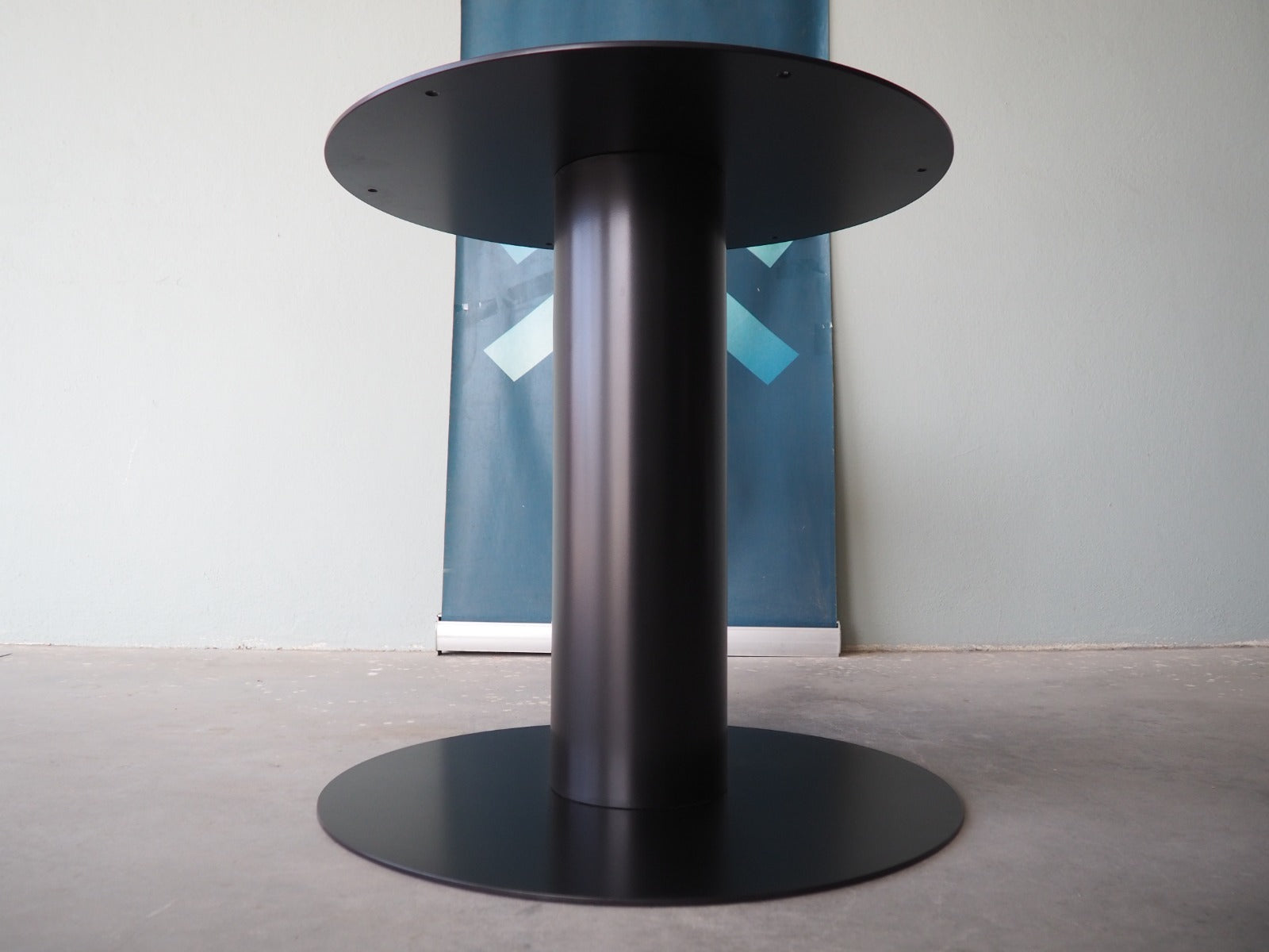 steel pedestal dining table base.